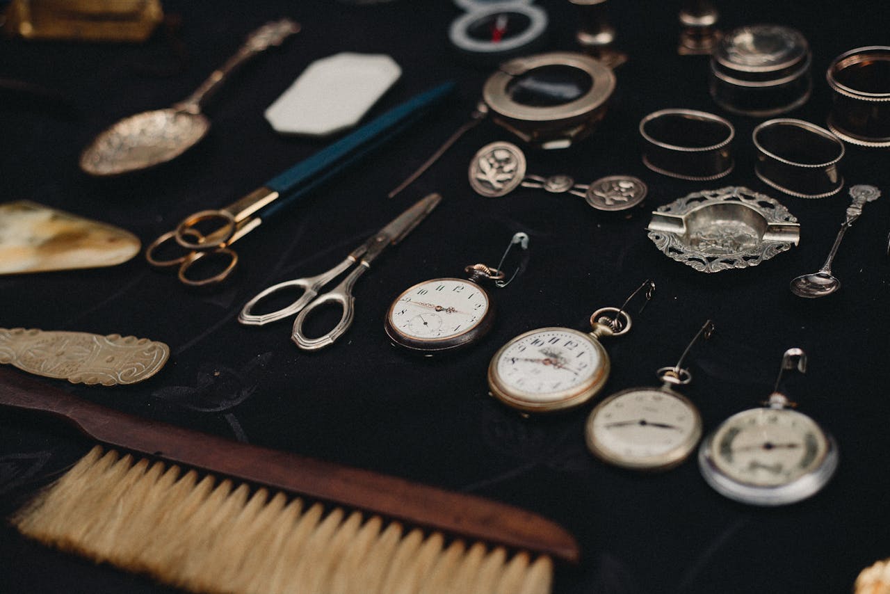 A selection of vintage pocket watches and antiques on display, embodying retro elegance.